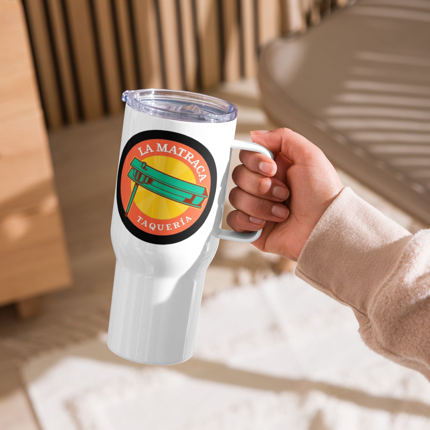 Travel mug with a handle